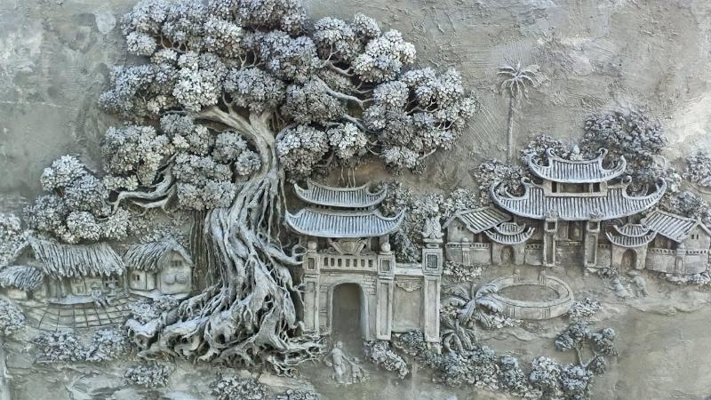 Tranh phù điêu làm từ chất liệu xi măng