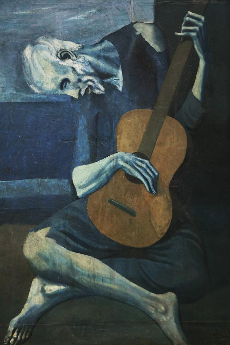 Tác phẩm ‘The Old Guitarist’ khắc họa người đàn ông mù gầy gò ôm cây đàn guitar