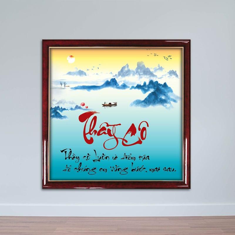 Tranh thư pháp với chữ "Thầy Cô", hình ảnh núi non hùng vĩ và chiếc thuyền nhỏ, tượng trưng cho thầy cô là điểm tựa vững chắc cho học trò
