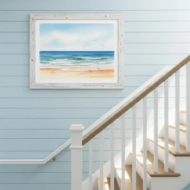 Tranh treo cầu thang bãi biển trên tường lam.