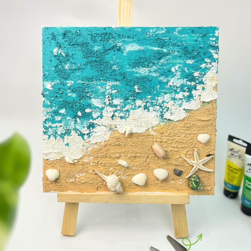 Sự kết hợp giữa cát, vỏ sò và các vật liệu khác tạo nên bức tranh cát đại dương rực rỡ và lôi cuốn
