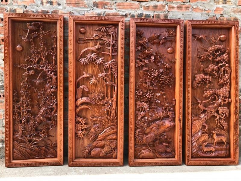 Chất liệu gỗ mộc mạc và nghệ thuật chạm khắc tinh vi tạo nên không gian ấm cúng, sang trọng và giàu chiều sâu văn hóa