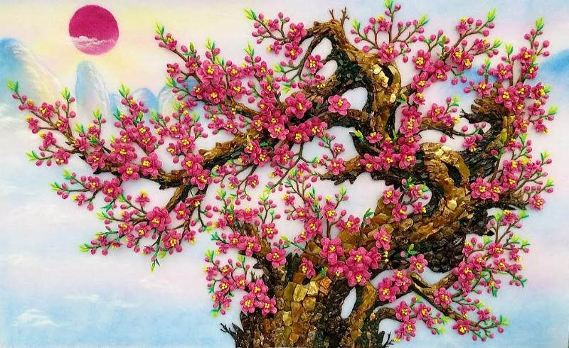 Tranh hoa đào đá quý có sắc hồng phớt giúp không gian thêm phần sang trọng