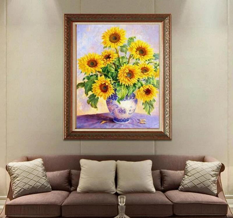 Tranh hoa hướng dương thêu tay thể hiện khí phách, bản lĩnh mạnh mẽ và lời chúc cho sự thành công, vượng khí