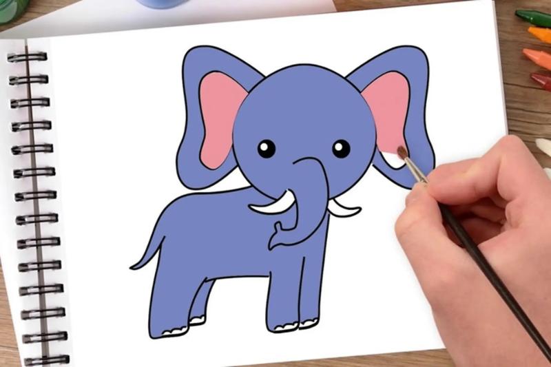 Tranh tô màu con voi đẹp dễ thương cho bé sáng tạo mỗi ngày 14 Tranh tô màu con voi dáng đứng dễ thương với tai to và vòi giơ cao