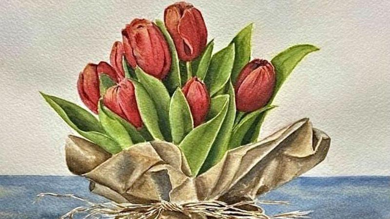 Bó hoa tulip đỏ thắm được gói thủ công bằng giấy kraft mộc mạc và tinh tế