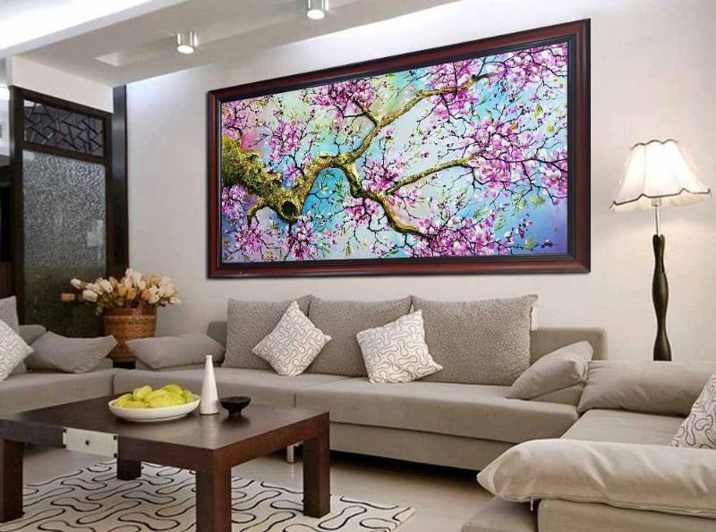 Tổng chiều dài của bức tranh treo tường nên bằng 2/3 của phòng khách 