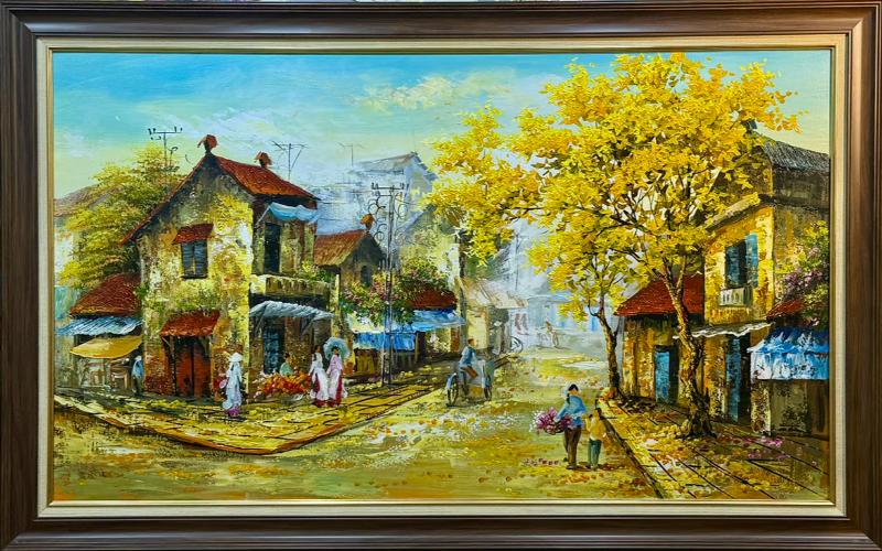 Tranh sơn dầu tái hiện góc phố yên bình trong sắc vàng rực của mùa thay lá, với những ngôi nhà cổ, hàng cây sáng nắng và nhịp sống chậm rãi, gợi cảm giác ấm áp và đầy hoài niệm